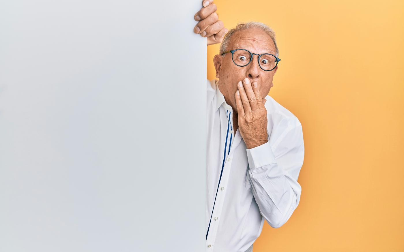 man in white dress shirt wearing black framed eyeglasses by krakenimages courtesy of Unsplash.