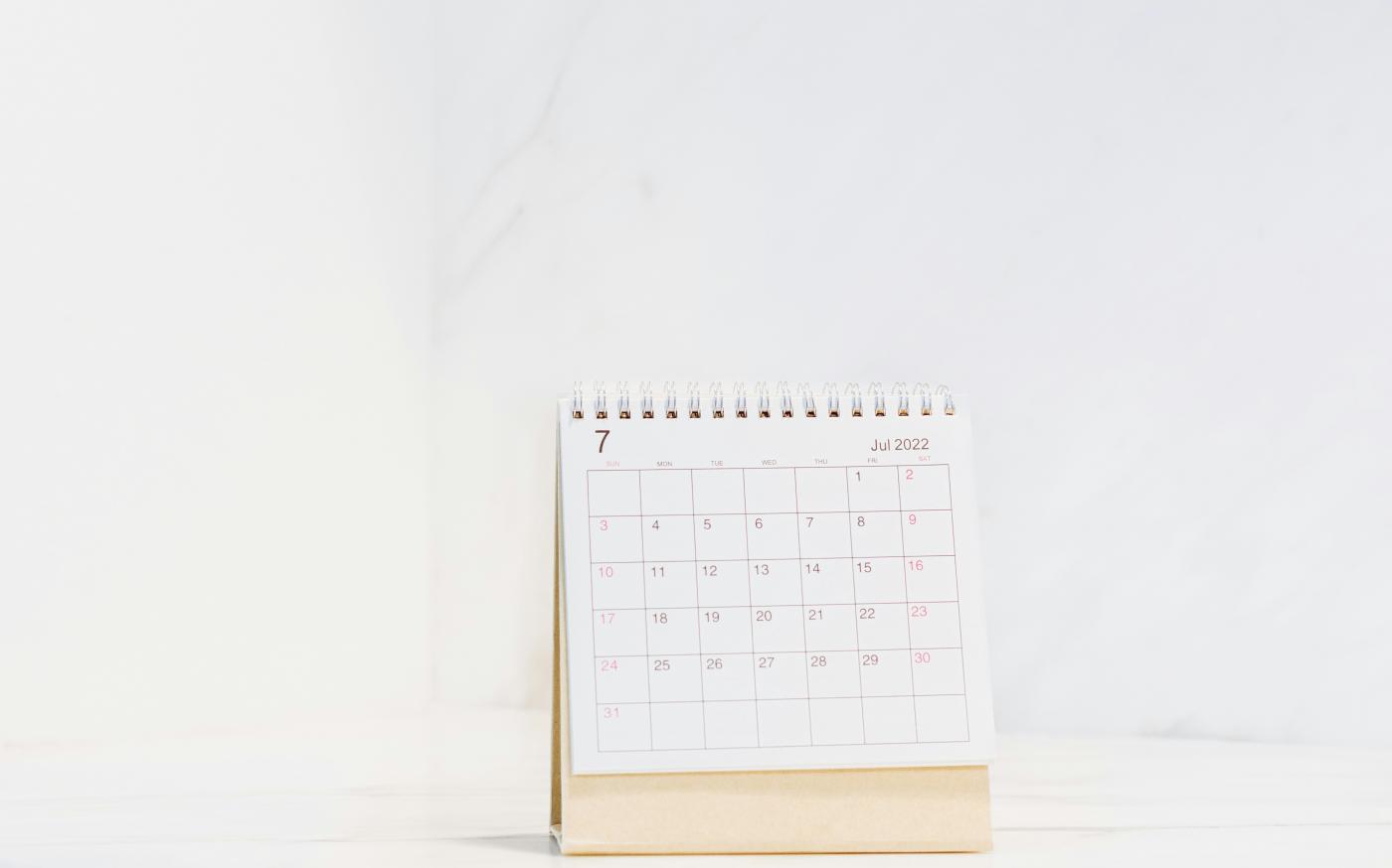 a calendar sitting on top of a table by Blessing Ri courtesy of Unsplash.