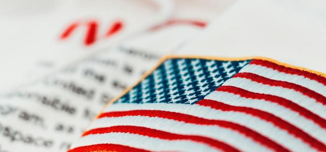 United States of America flag embroidery by Jannis Lucas courtesy of Unsplash.